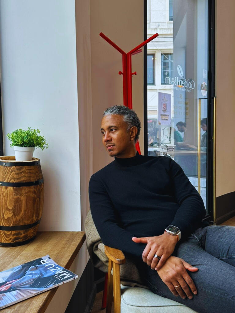 Portrait of Brian Tomlinson, content marketing leader and creator, smiling in a professional setting.